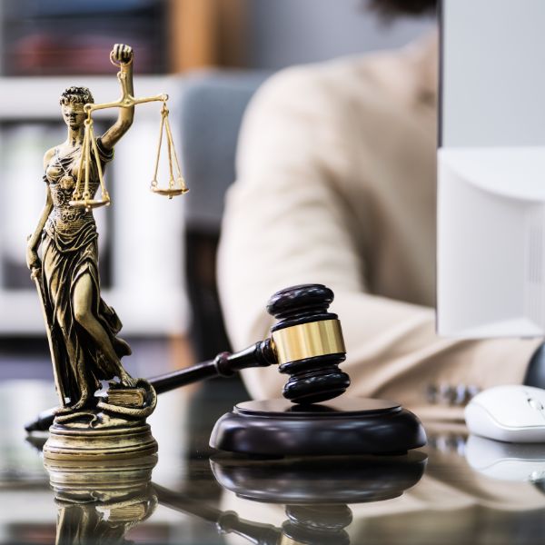 Attorney working on a computer table