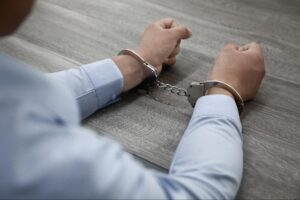 male hands in handcuffs