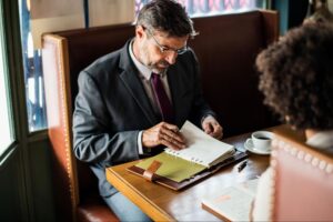 A man with a notebook