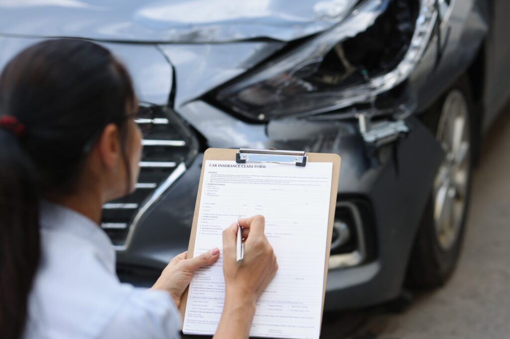 woman documenting an accident