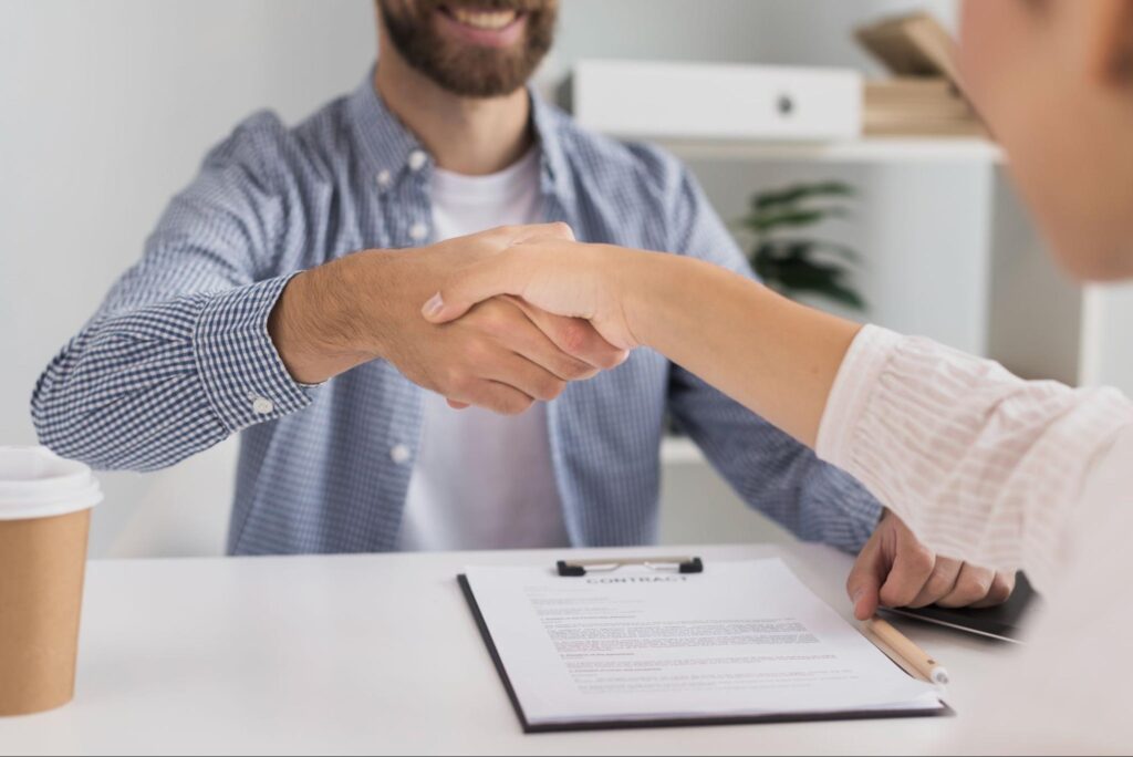 Two people doing a handshake