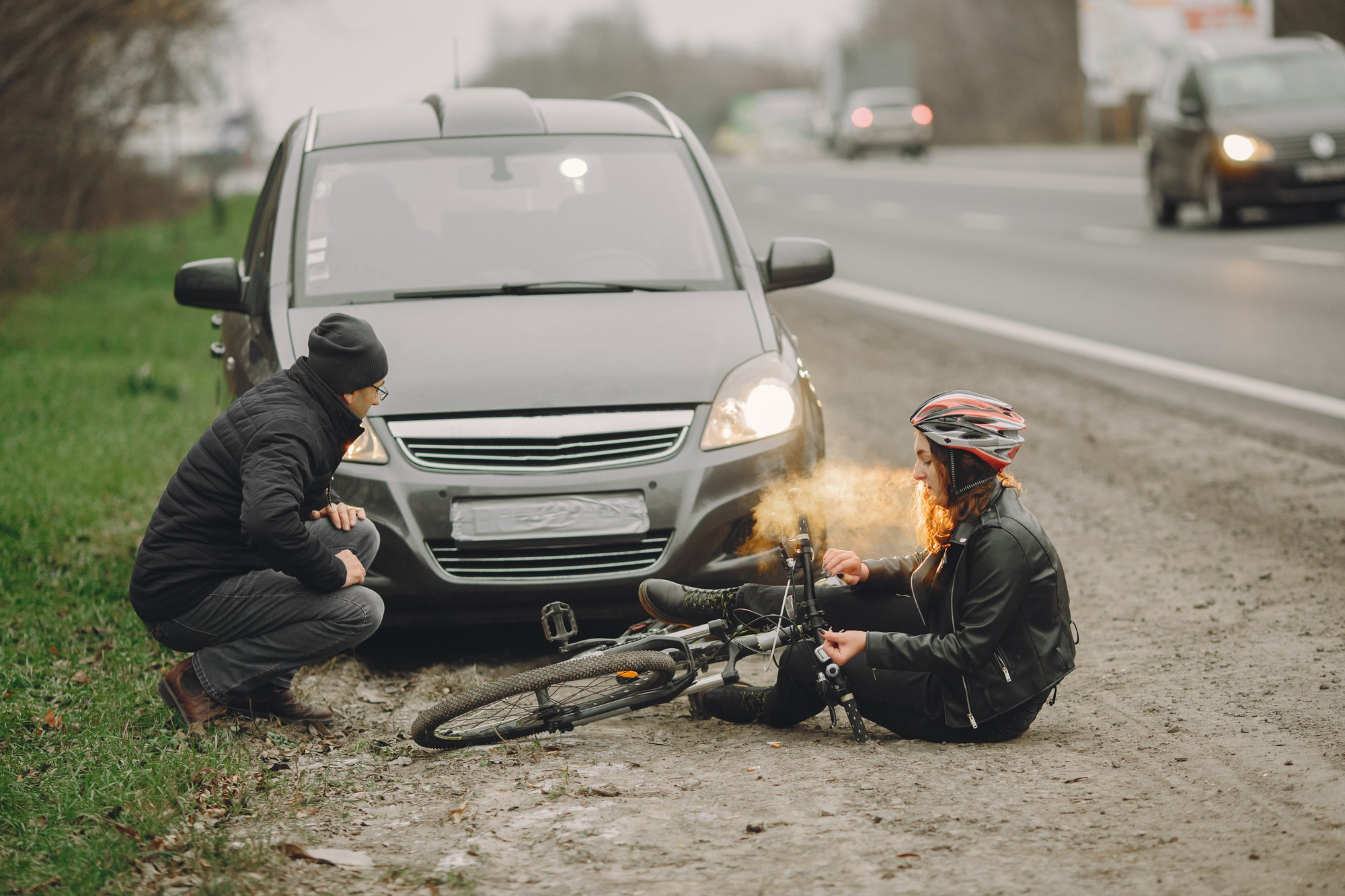 A girl who has fallen off her bicycle