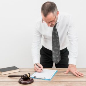 A man writing on a paper